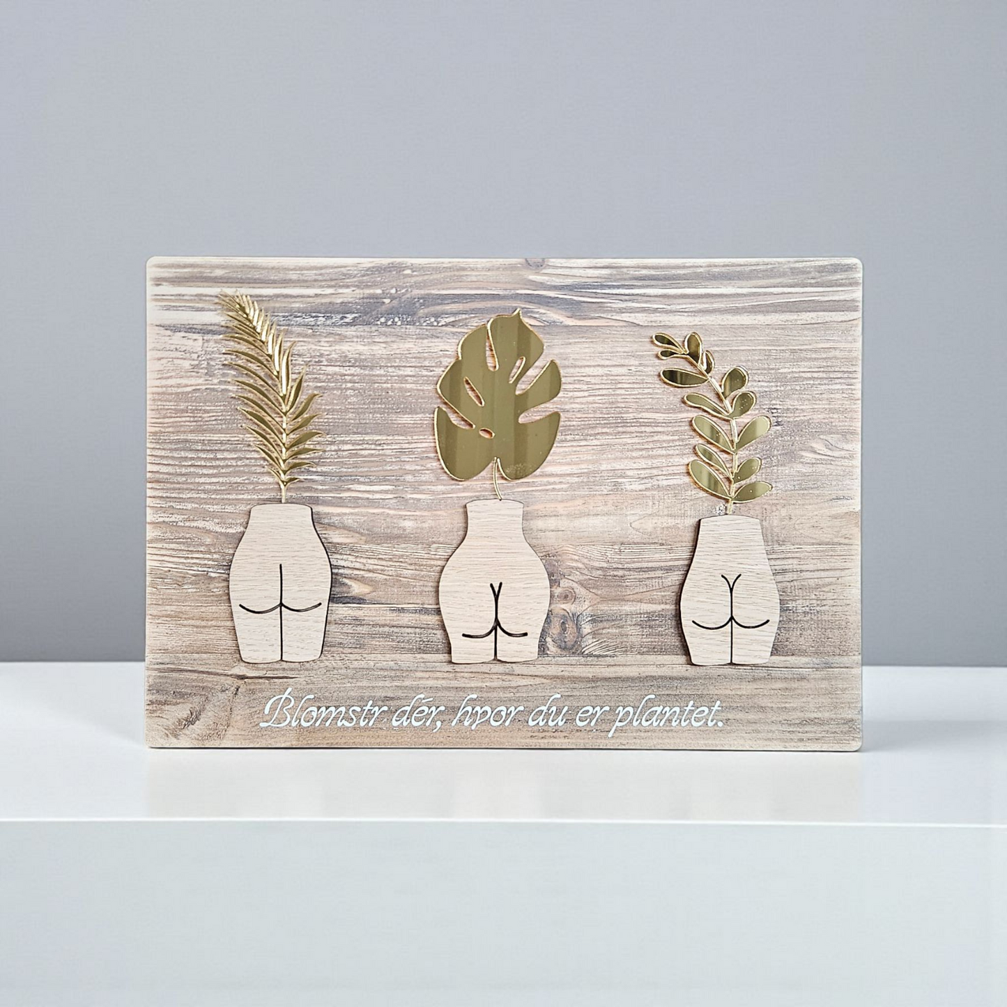 Unikt vægskilt – Blomstr dér