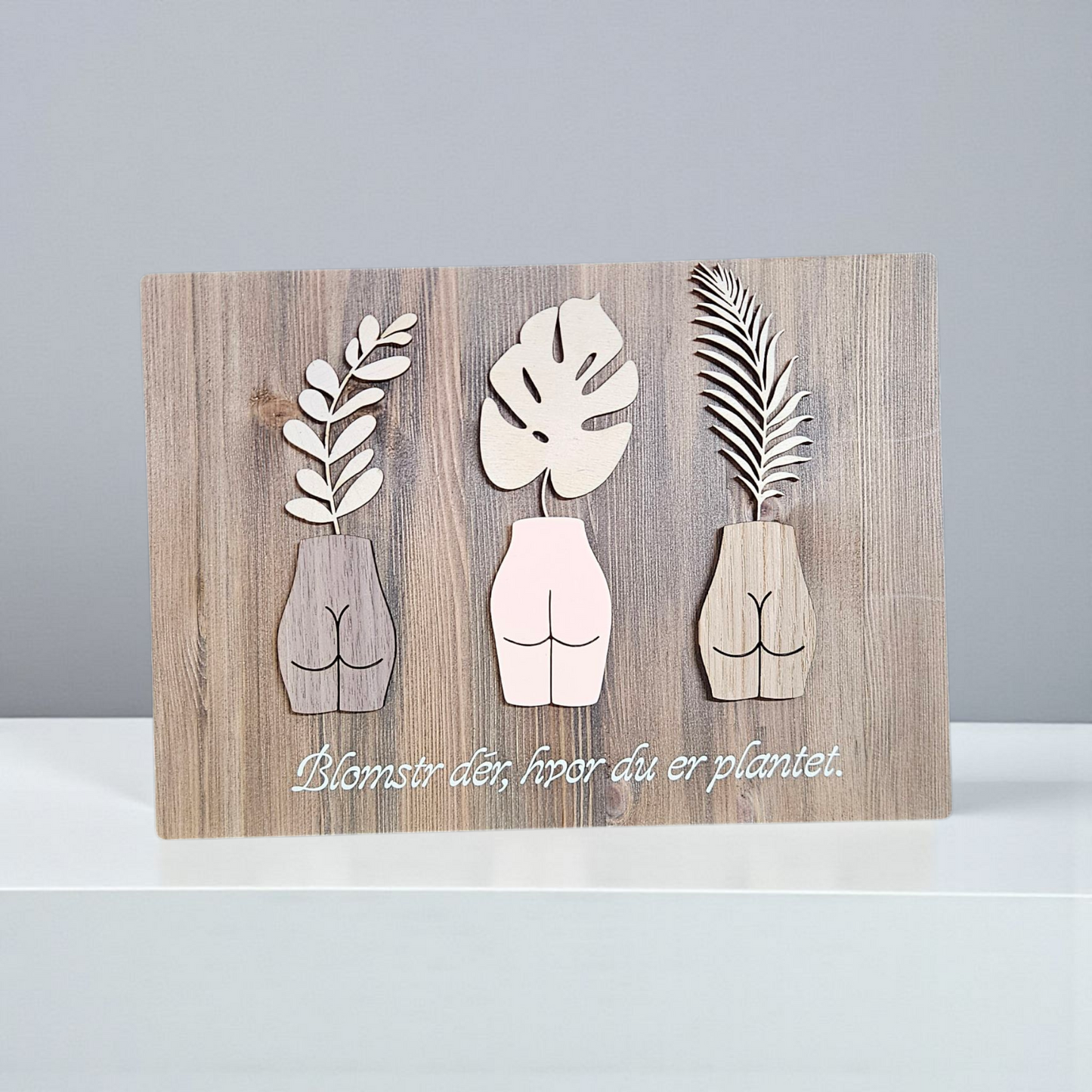Unikt vægskilt – Blomstr dér