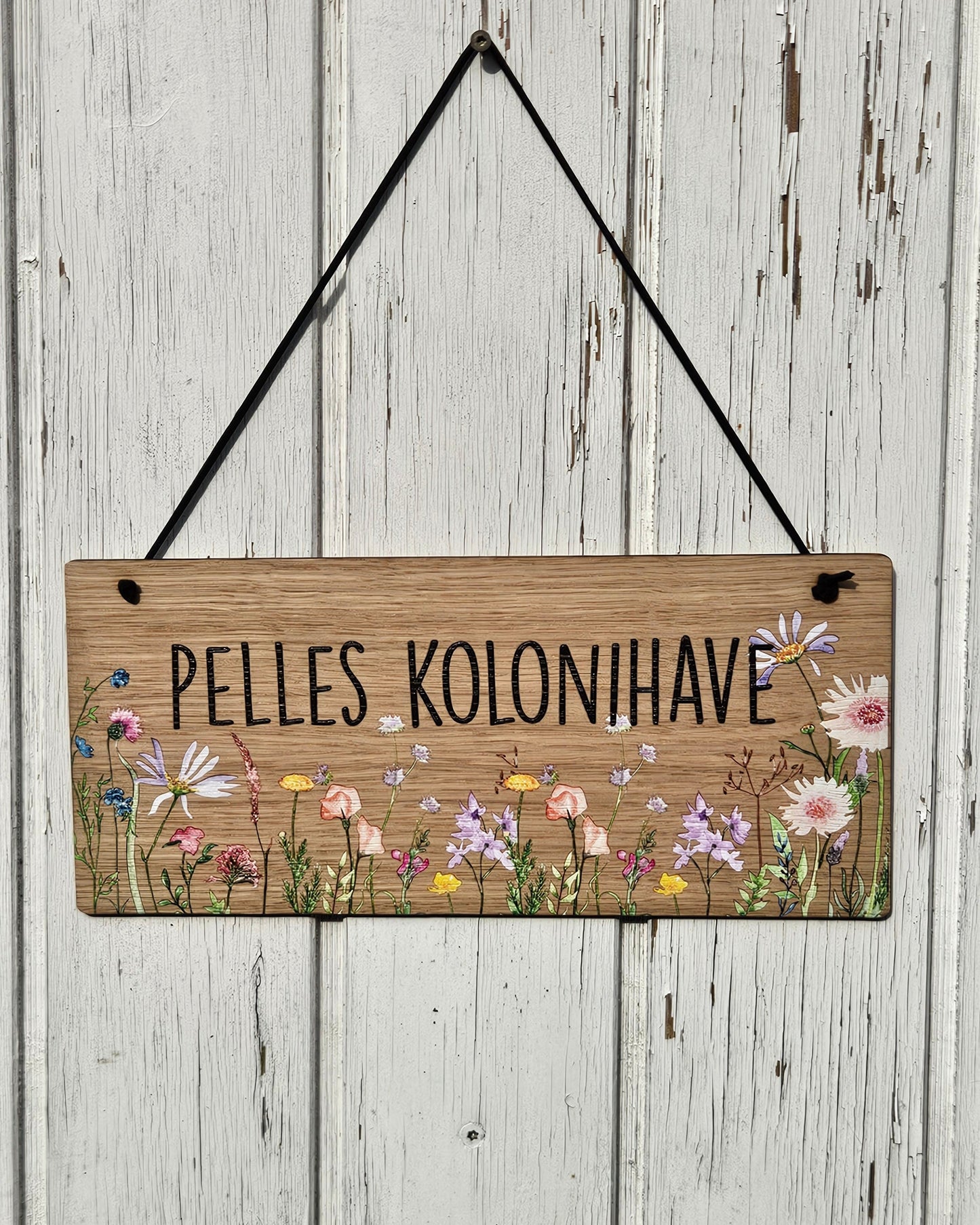 Vi er i haven – Træskilt